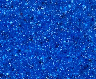 Leisure Pools fibreglass pool in Sapphire Blue showing deep blue water with a jewel-like sparkle.